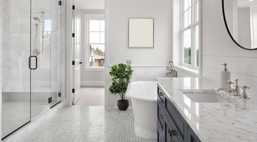 mostly-white-bathroom-with-tile-floors-and-dark-blue-vanity-pleasant-grove-ut